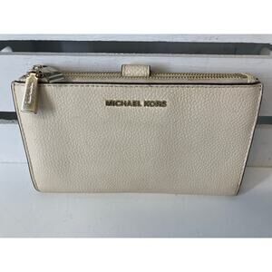 MICHAEL KORS, LARGE IVORY PEBBLED LEATHER WALLET